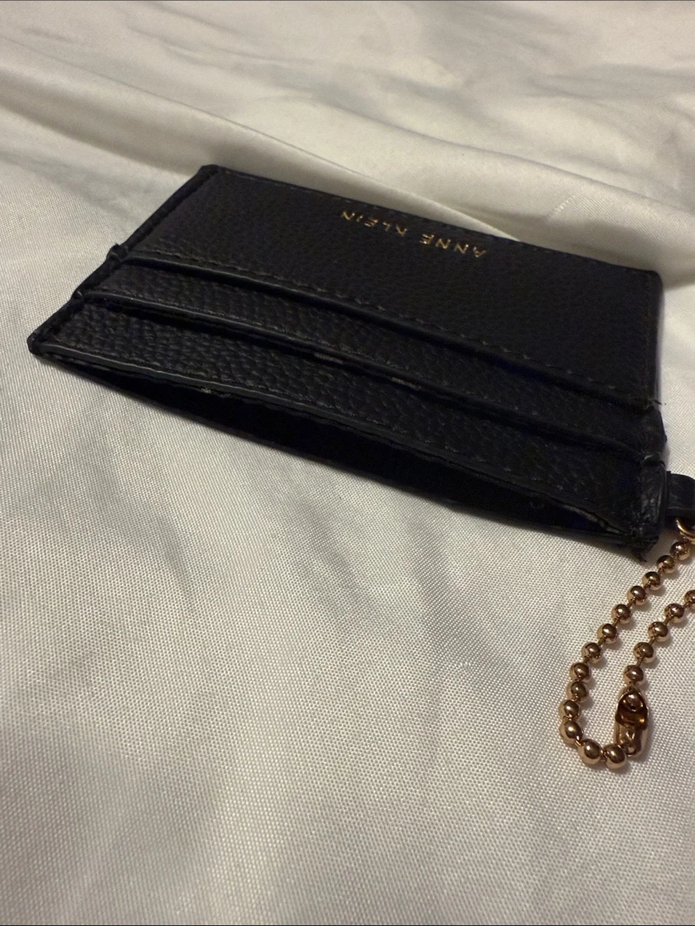 Anne Klein Black Pebbled Leather Card Case with Rose Gold Chain